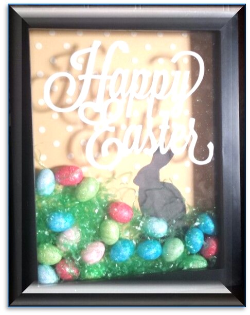 Shadowbox with jelly beans, easter grass, Happy Easter and rabbit images.