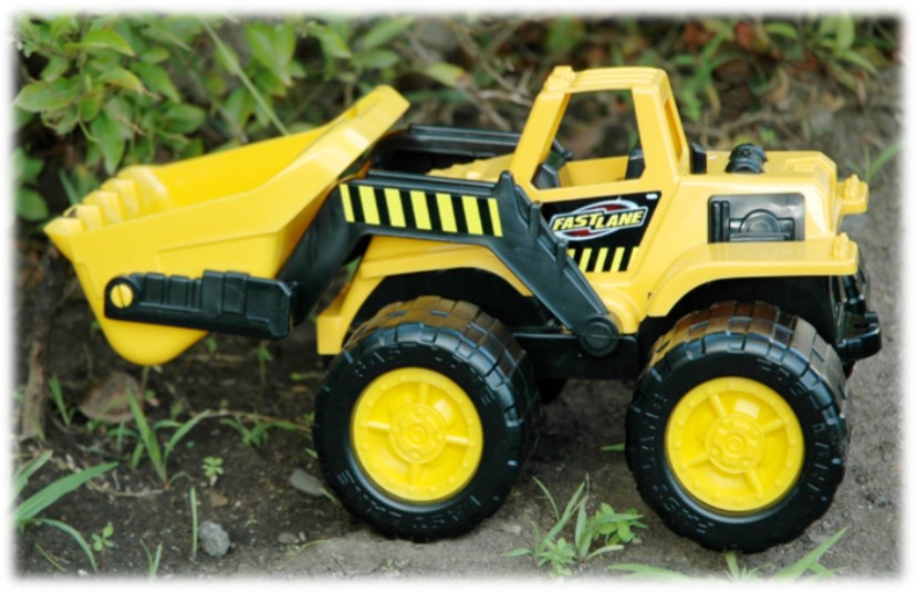 Yellow and black toy top loader machine.
