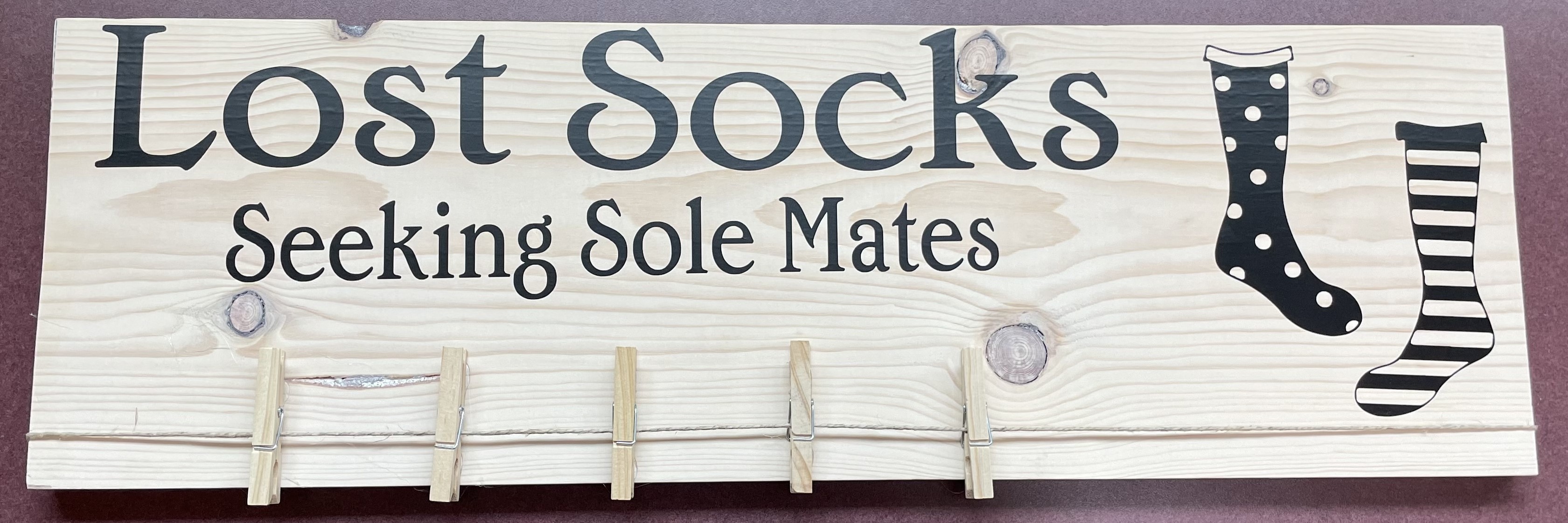 "Lost Socks Seeking Sole Mates" wood sign