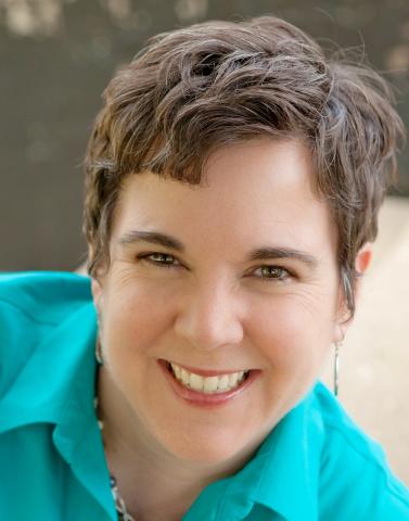 Headshot of a smiling woman. 