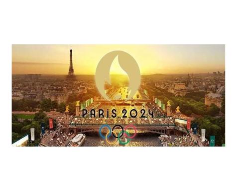 view of Paris with Olympic rings and flame