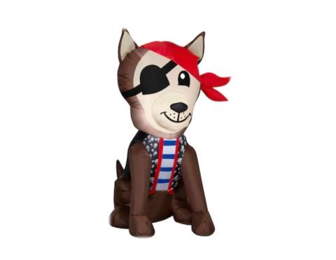 brown and tan dog dressed like a pirate with an eye patch, bandana and striped shirt