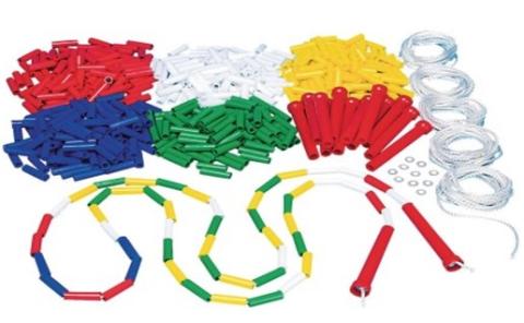 Colored jump rope and multi-colored beads and supplies.