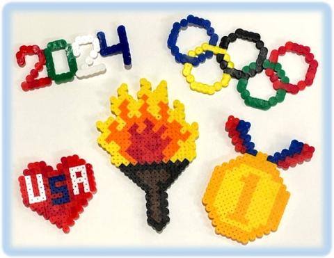 Perler bead designs in a Olympic torch, Olympic rings, gold medal, heart with USA, and 2024.