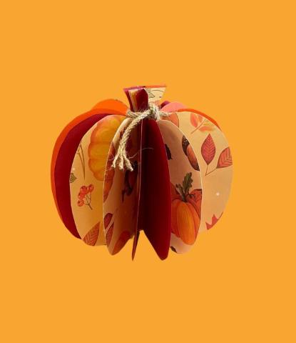 A pumpkin made out of paper. 