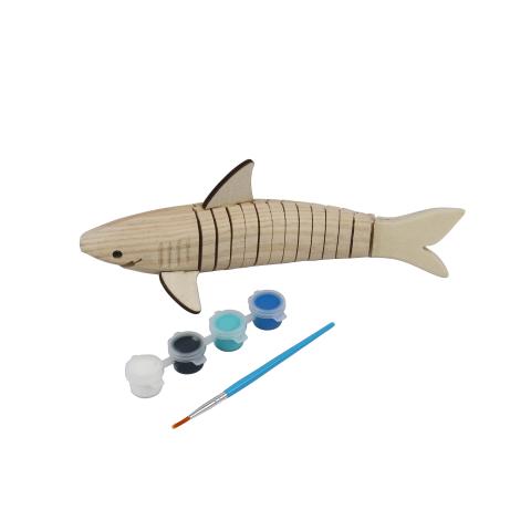 Wooden shark that wiggles because of cut outs in the middle of the shark. 4 pots of paints in white, black, light blue, and dark blue with a paint brush. 
