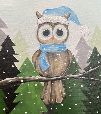 Owl perched on a tree branch wearing a blue scarf and blue santo hat with white trim. Different shade of green pine trees in background with light blue sky and snow flurries. 