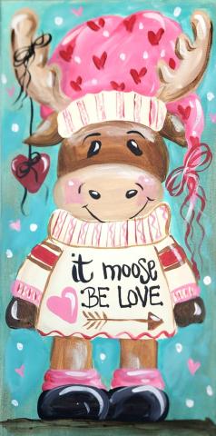 Brown moose wearing a cream sweater with red and pink stripes. Sweater says "it moose be love". Moose has a pink hat with red hearts and white polka dots and a red heart hanging from one antler. 