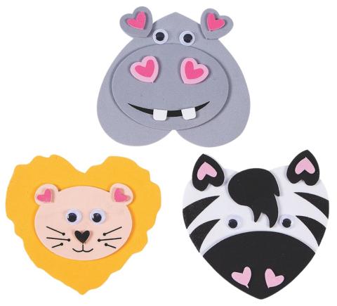 Foam gray hippo head with heart shaped face, ears and nostrils; heart shaped yellow and peach lion head with heart shaped ears and nose; and heart shaped black and white zebra head with heart shaped ears and nostrils.