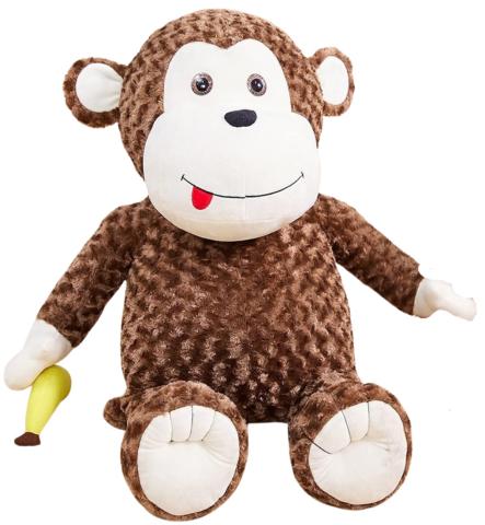 Large, brown stuffed chimpanzee with red tongue sticking out to the side holding a yellow banana. 