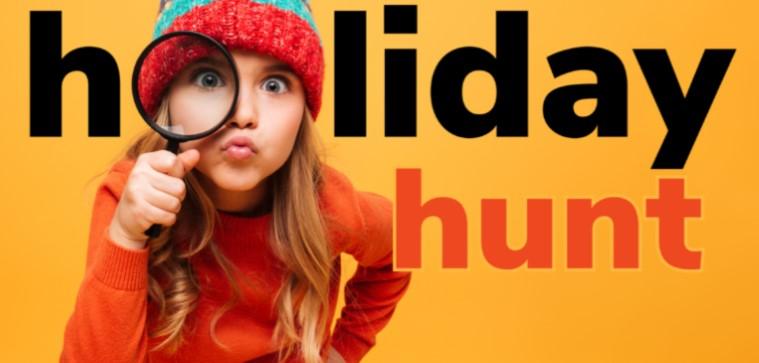 Girl with magnifying glass with green and red hat on yellow background. 