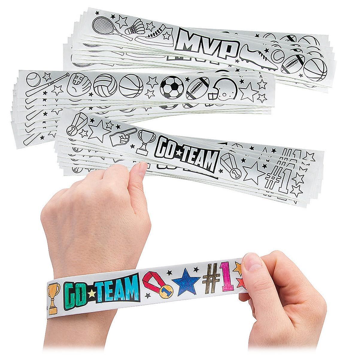 Right hand wrapping sports slap bracelet around left wrist.