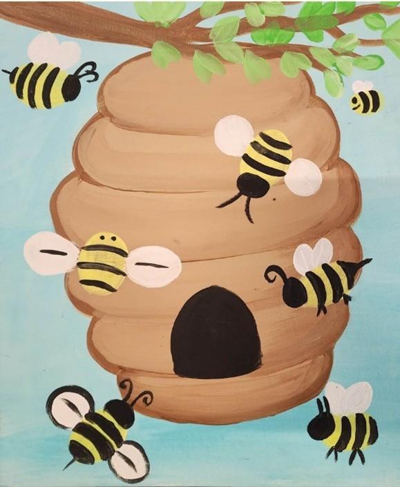 Beehive hanging from a tree with 7 bees buzzing around. Blue sky in the background. 