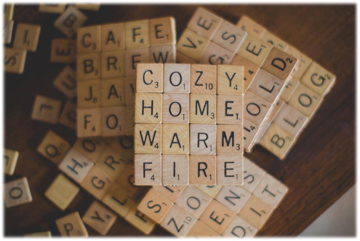 Square coasters with Scrabble Letters glued on top to form words: Cozy, Home, Warm and Fire. 