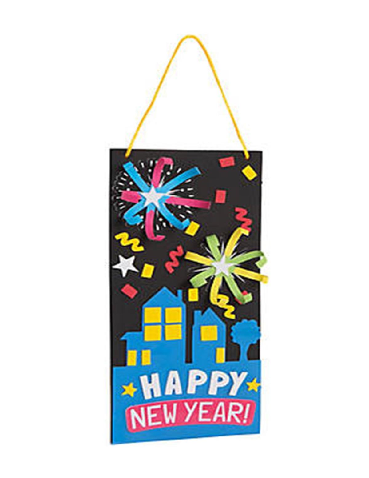 fireworks over buildings stating Happy New Year!